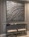Earth tone abstract mosaic wall art with taupe, grey, brown and light blue colors in textured wave pattern