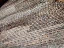Detail of geometric mosaic wall art brown and beige tones