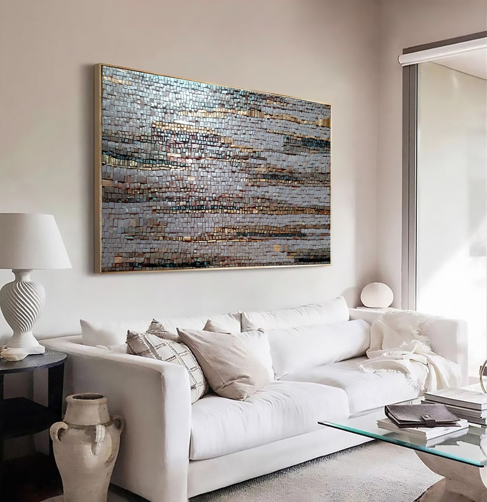 Gray and gold mosaic wall art with textured tiles arranged vertically and horizontally for modern interior decor