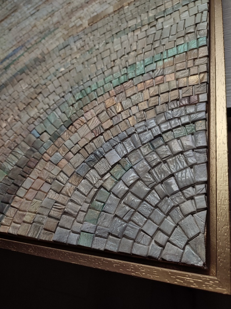 Detail of beige mosaic wall art on canvas with intertwining blue and green accents