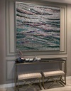Large mosaic wall art with teal and copper interwoven lines on a neutral beige background, modern and dynamic design